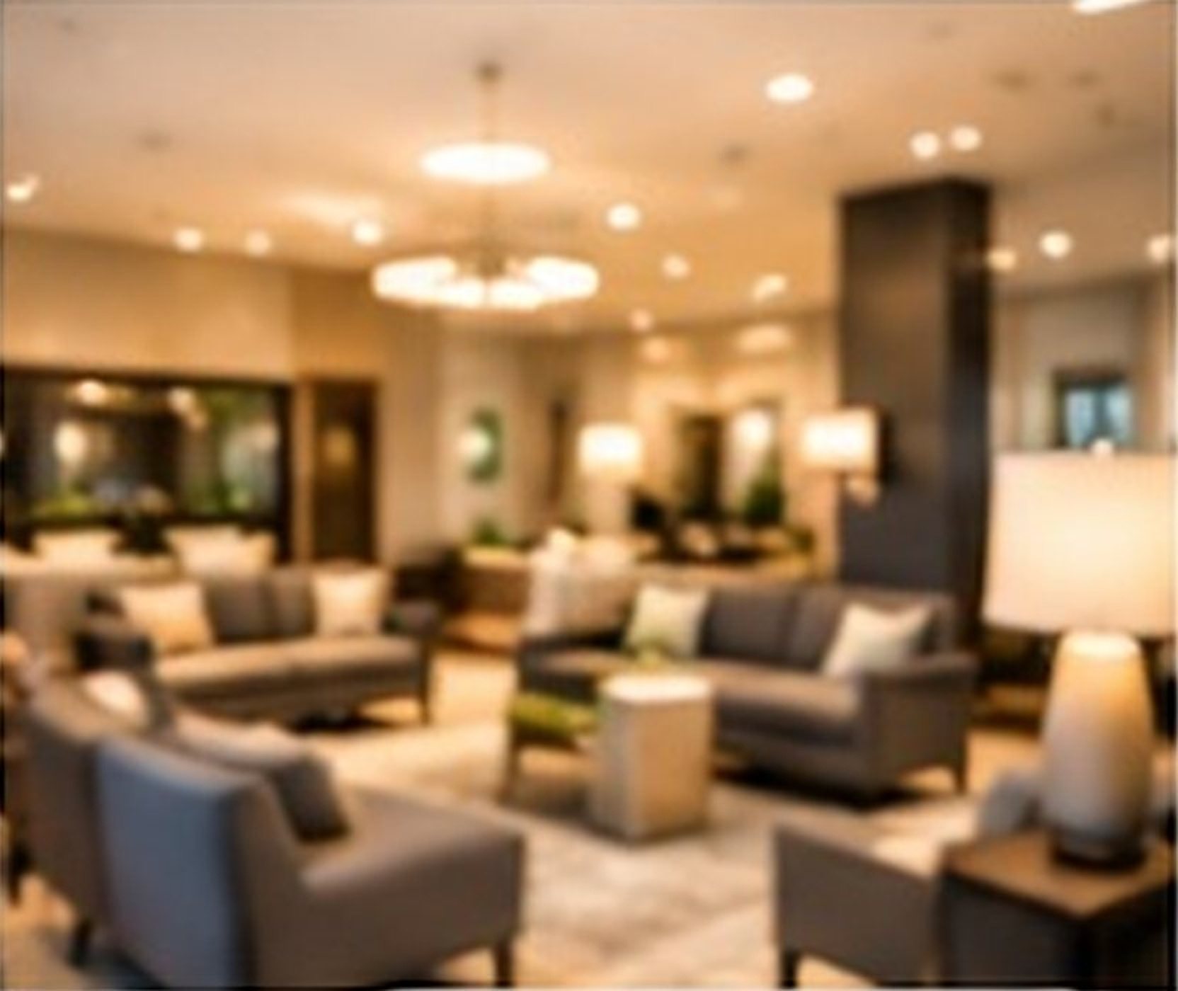 Warmly lit community clubhouse lounge
