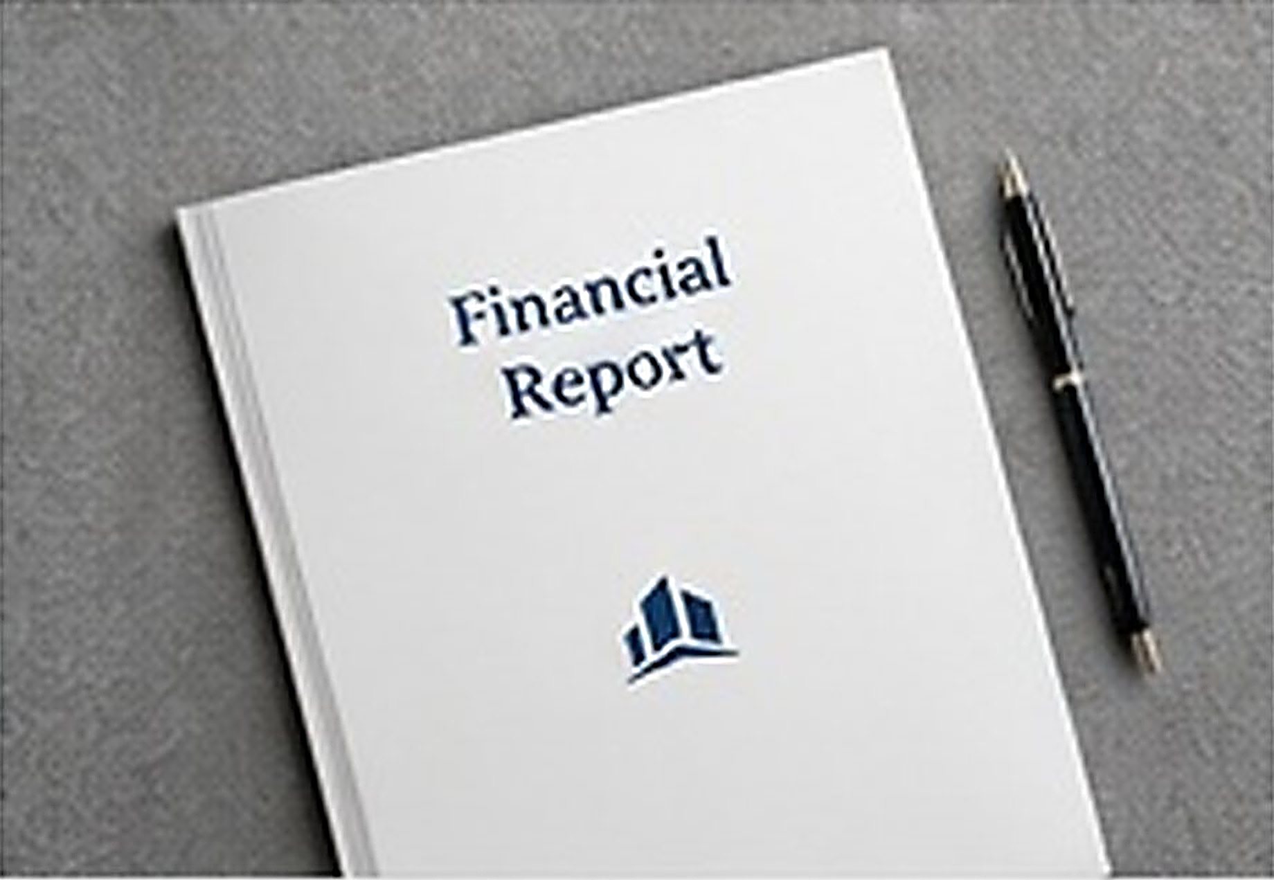 Financial report folder with a pen